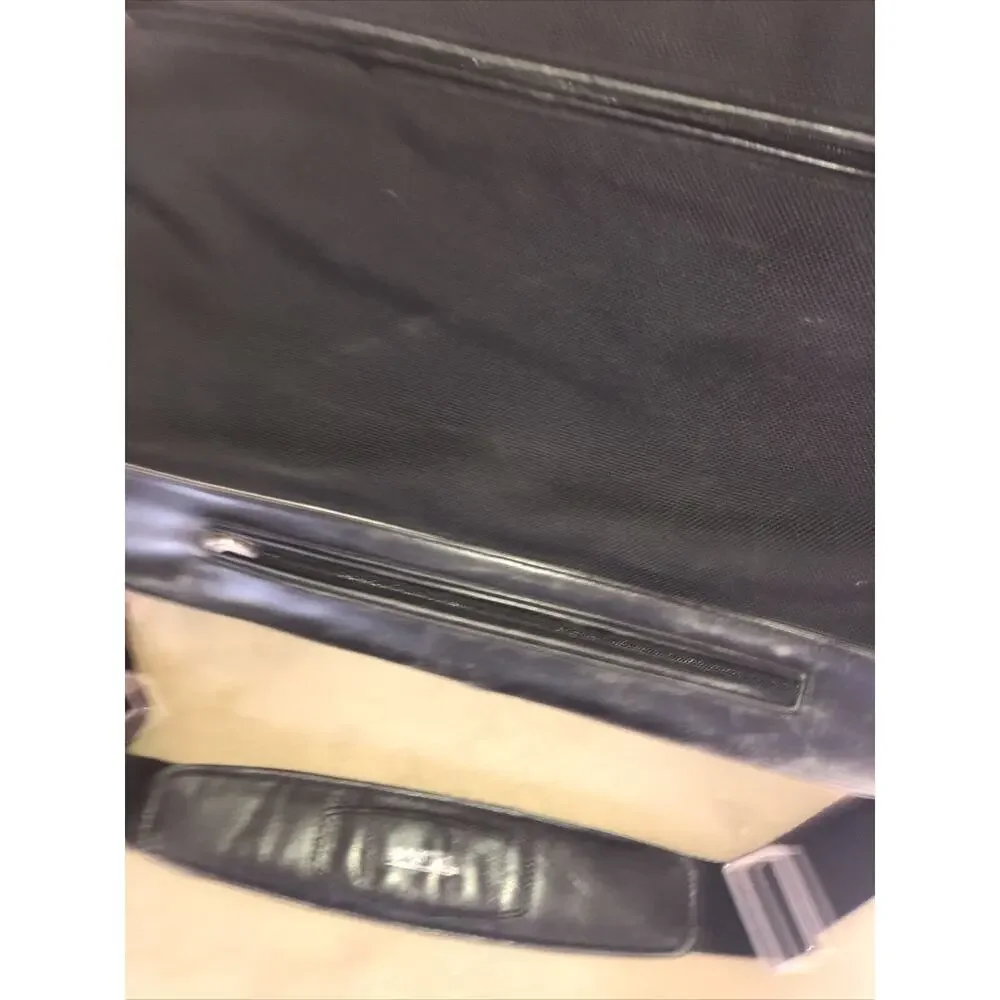 Tumi expandable leather